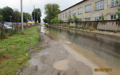 Новый асфальт на Комсомольской затопило дождевой водой